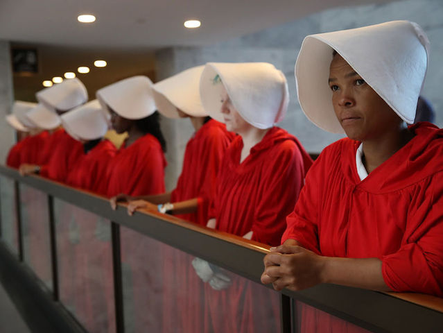 See photos of protesters at Brett Kavanaugh's confirmation hearing on Capitol Hill
